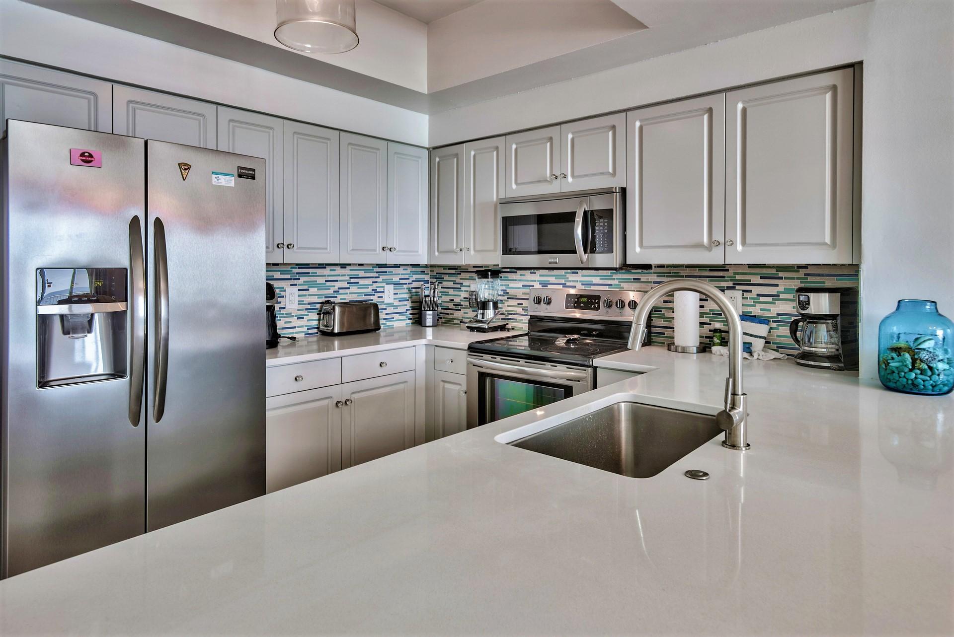 Majestic Sun 911B - Kitchen Featuring Stainless Steel Appliances