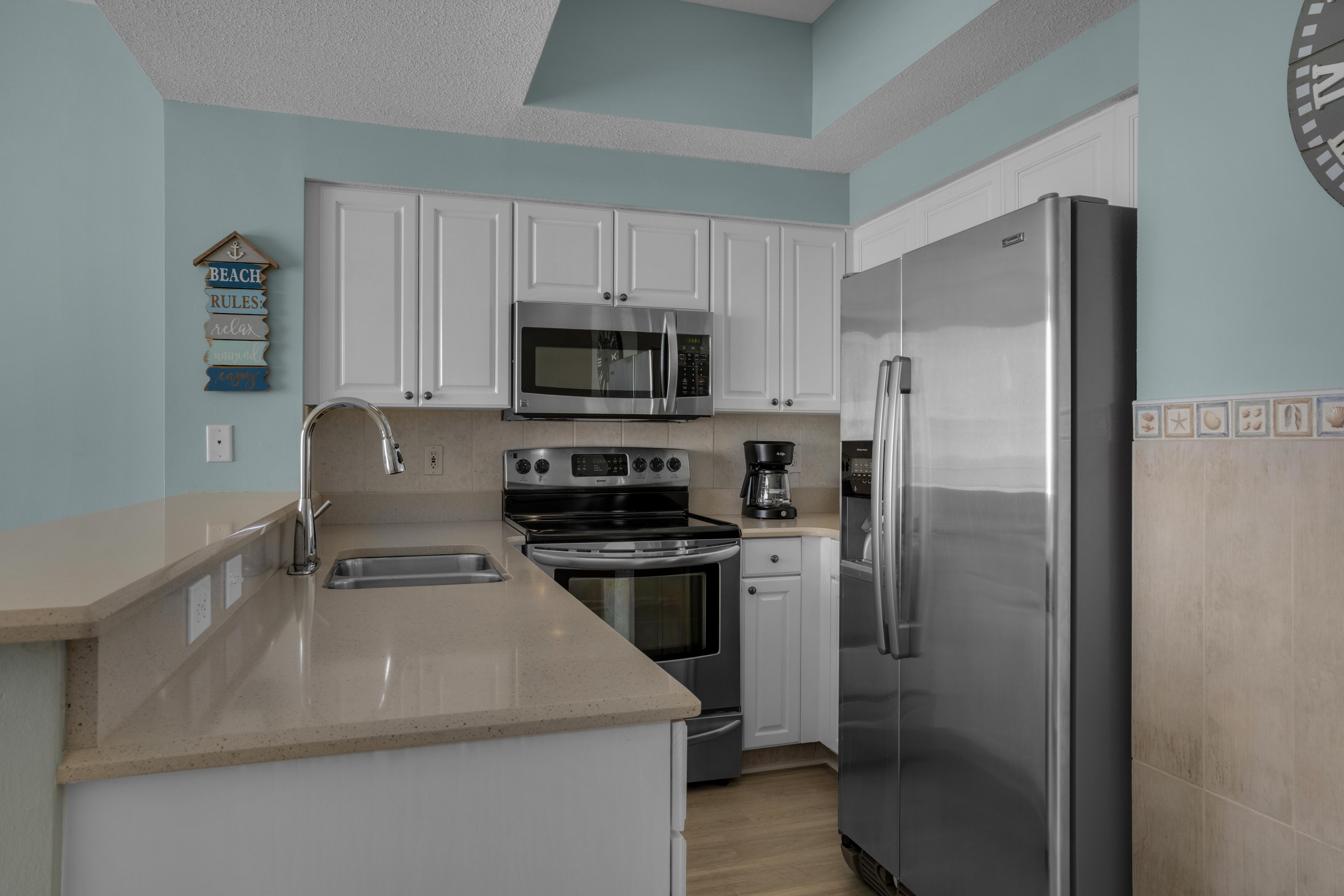 Majestic Sun 507B - Kitchen Featuring Stainless Steel Appliances