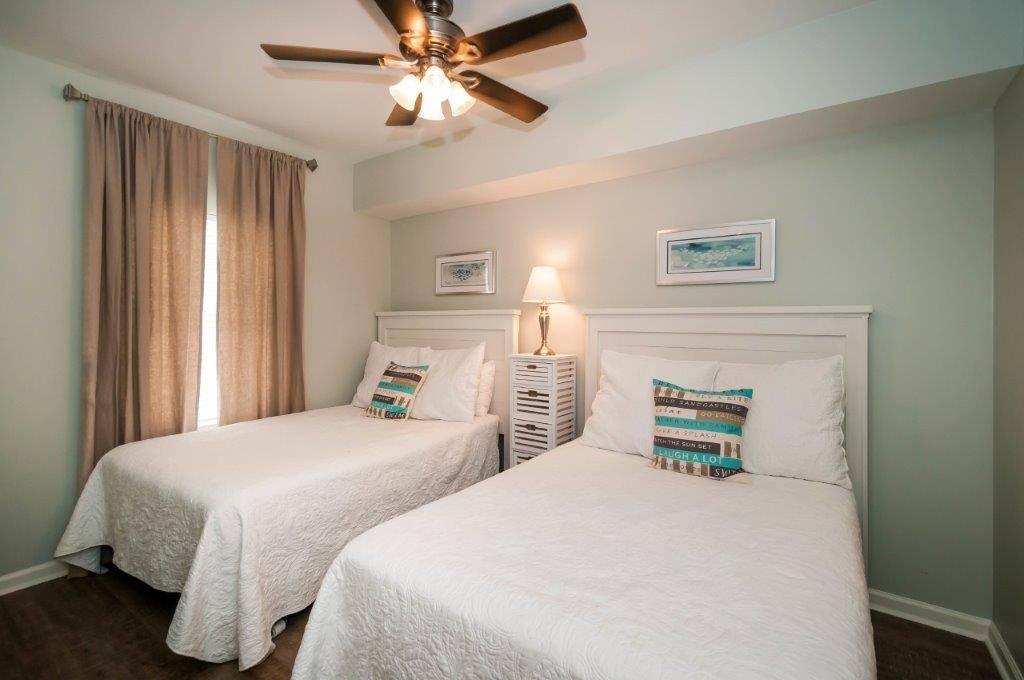 MS 1108B - Guest bedroom w/ two full beds and HDTV