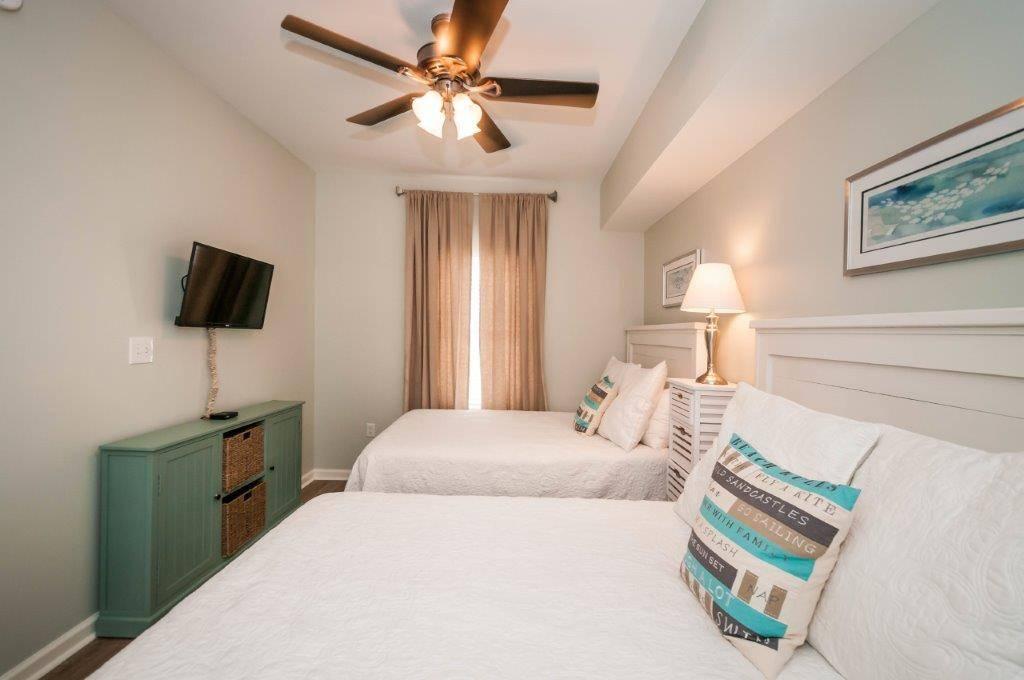 MS 1108B - Guest bedroom w/ two full beds and HDTV