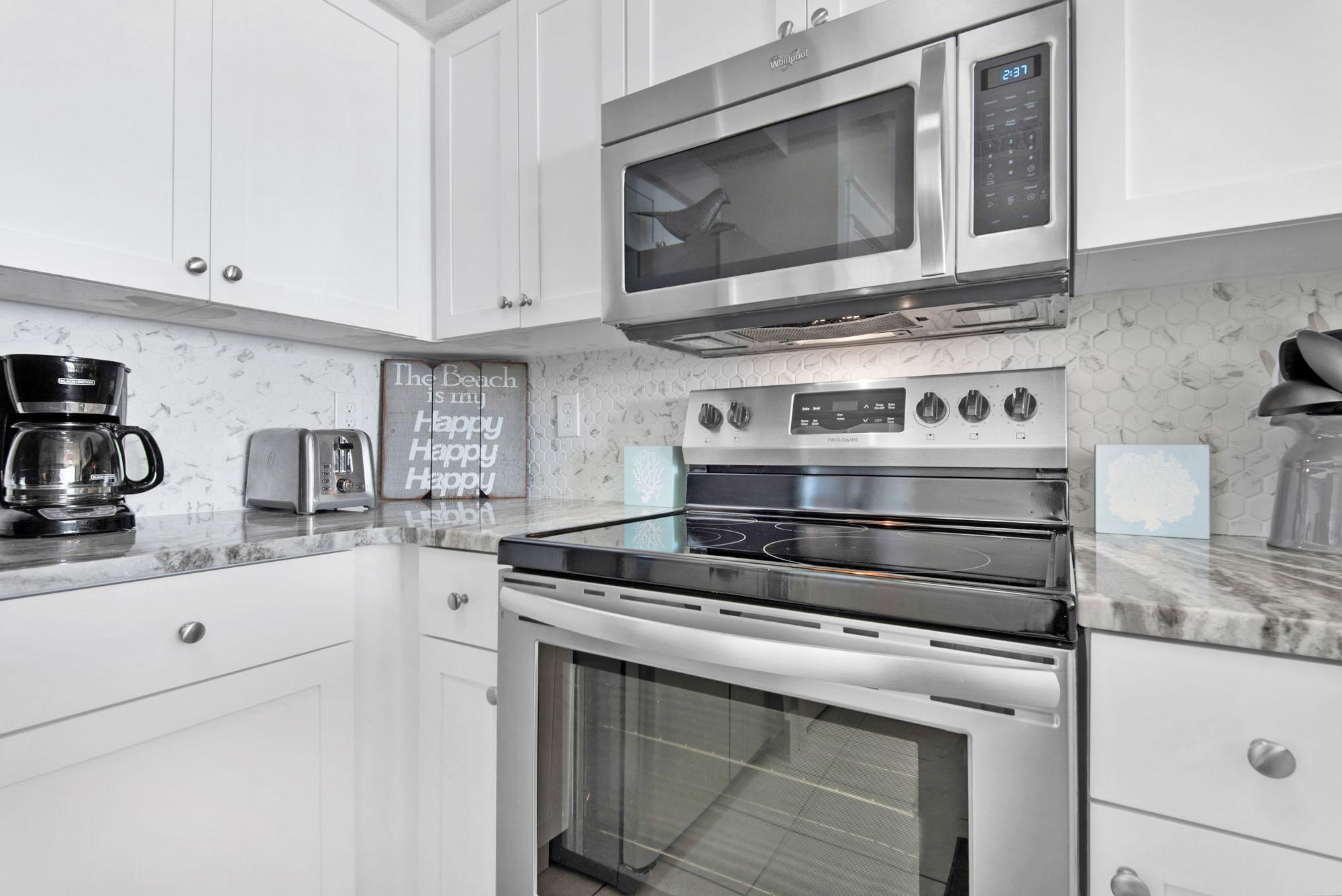 Majestic Sun 612B - Kitchen Featuring Stainless Steel Appliances