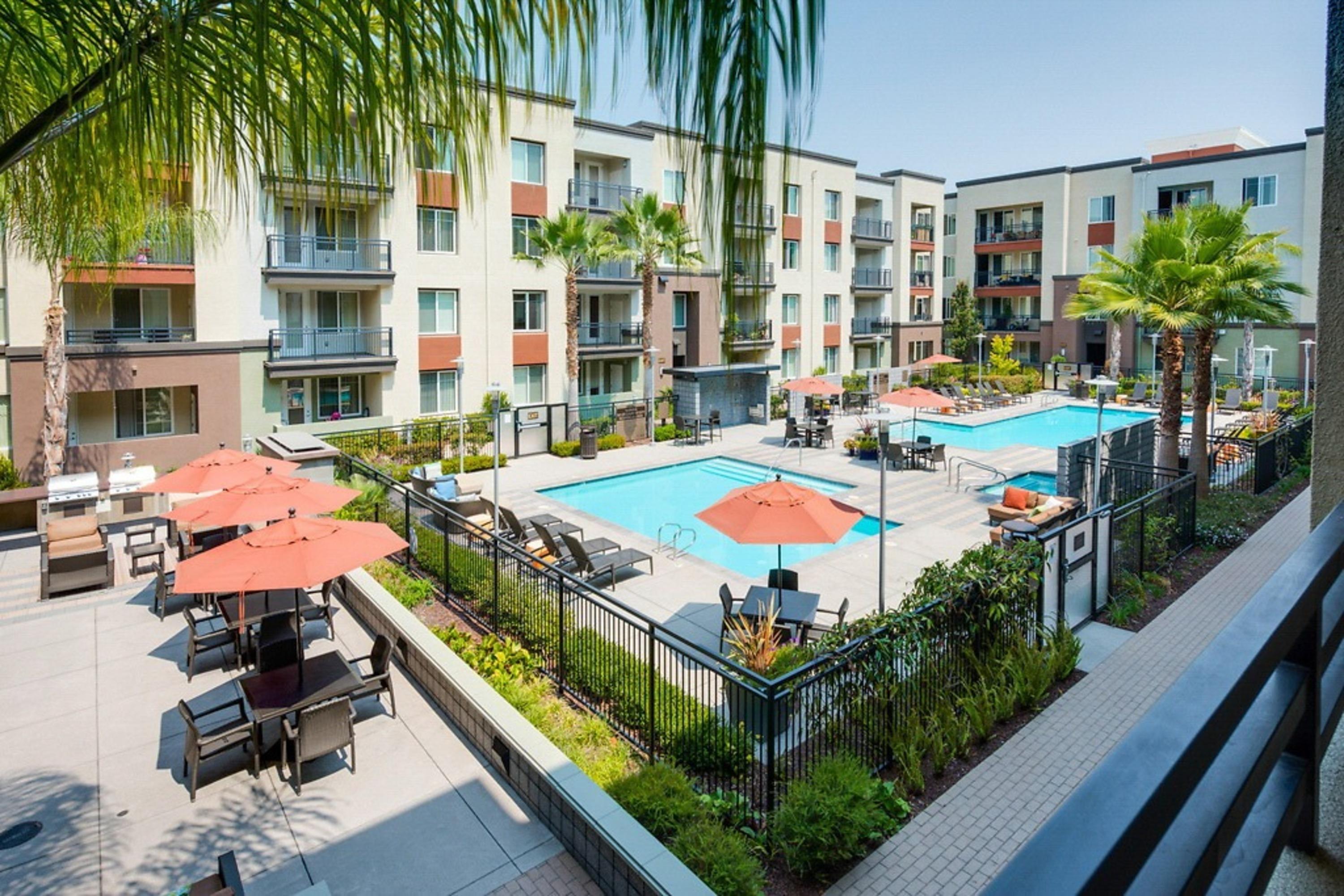 Lawrence Station 2BR Gem – Poolside Living