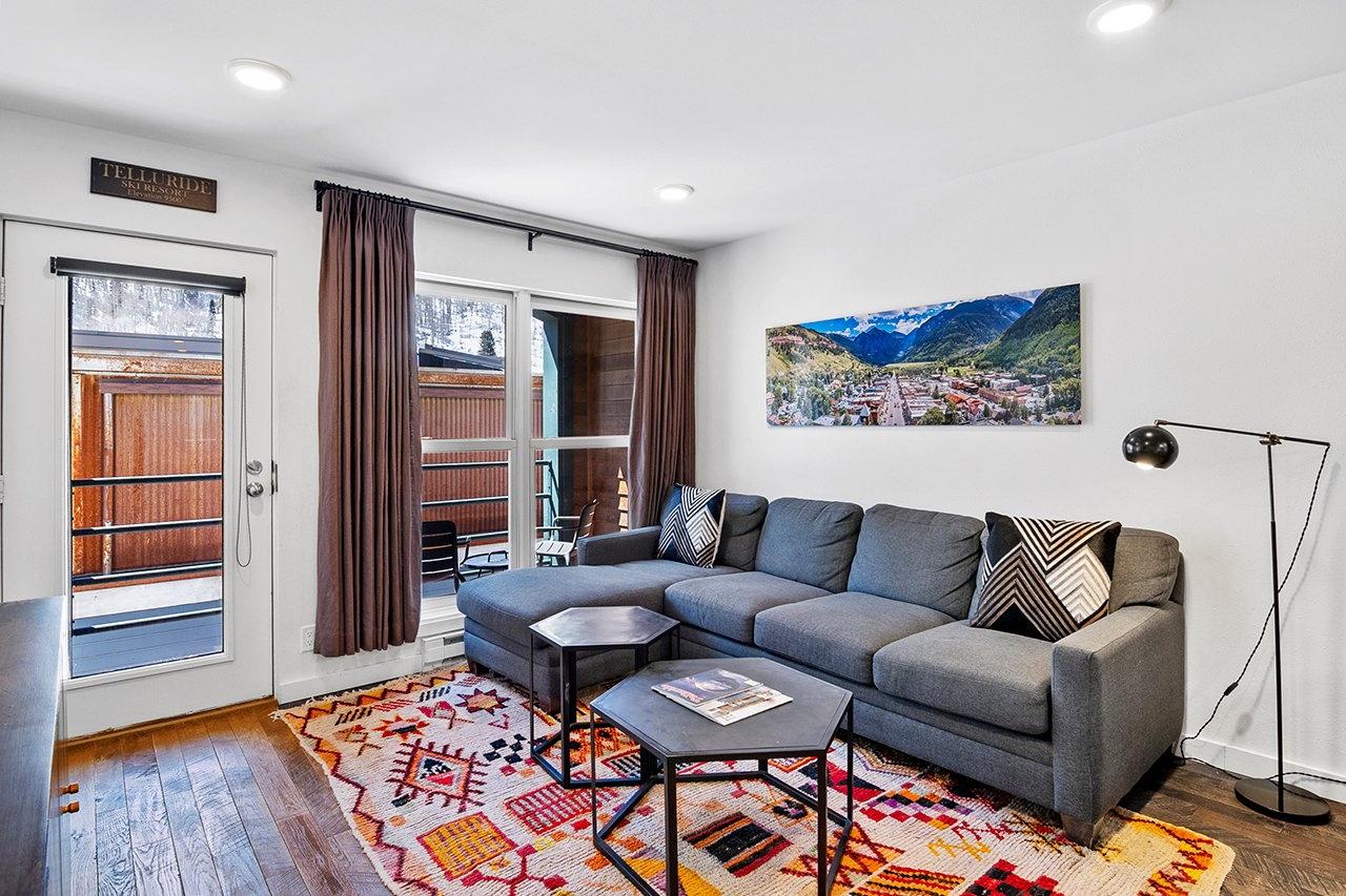 Top Floor Condo with Balcony | Steps To Lifts & Main Street 2 Bedroom Condo