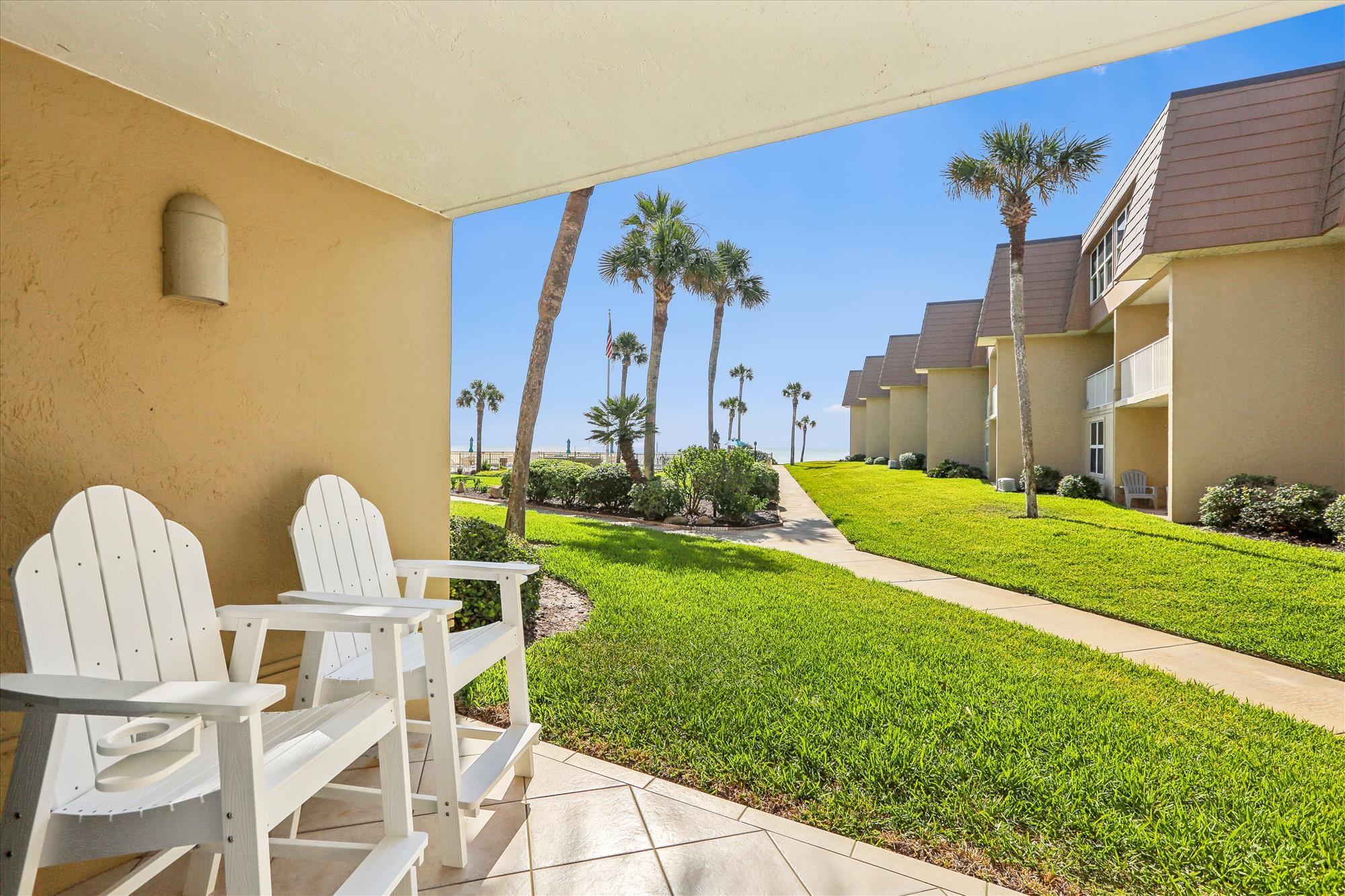 Beachfront Gem: Serene 2BD Haven with Pool & Views