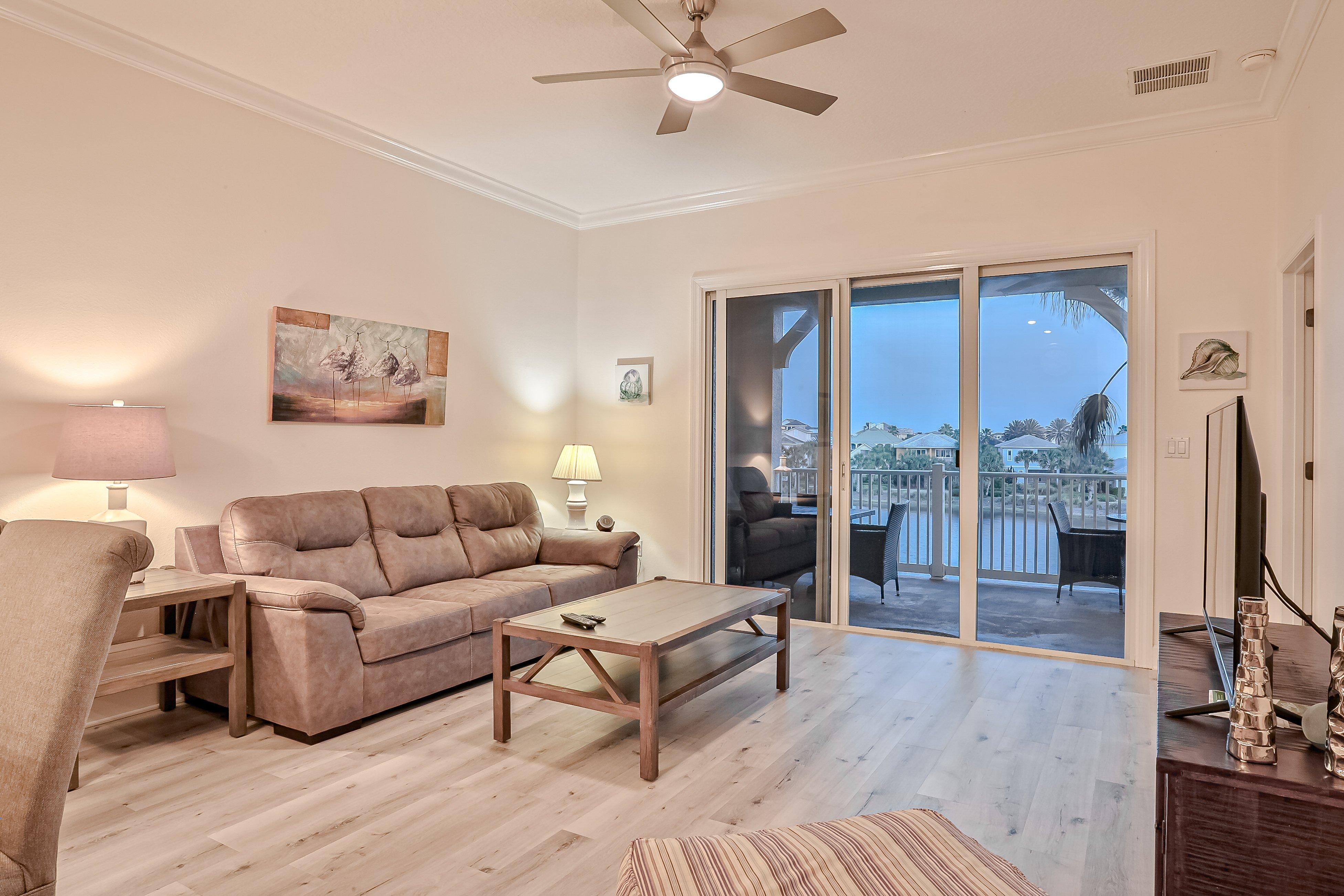 Elegant waterfront condo with central AC, balcony, and shared pools & hot tubs