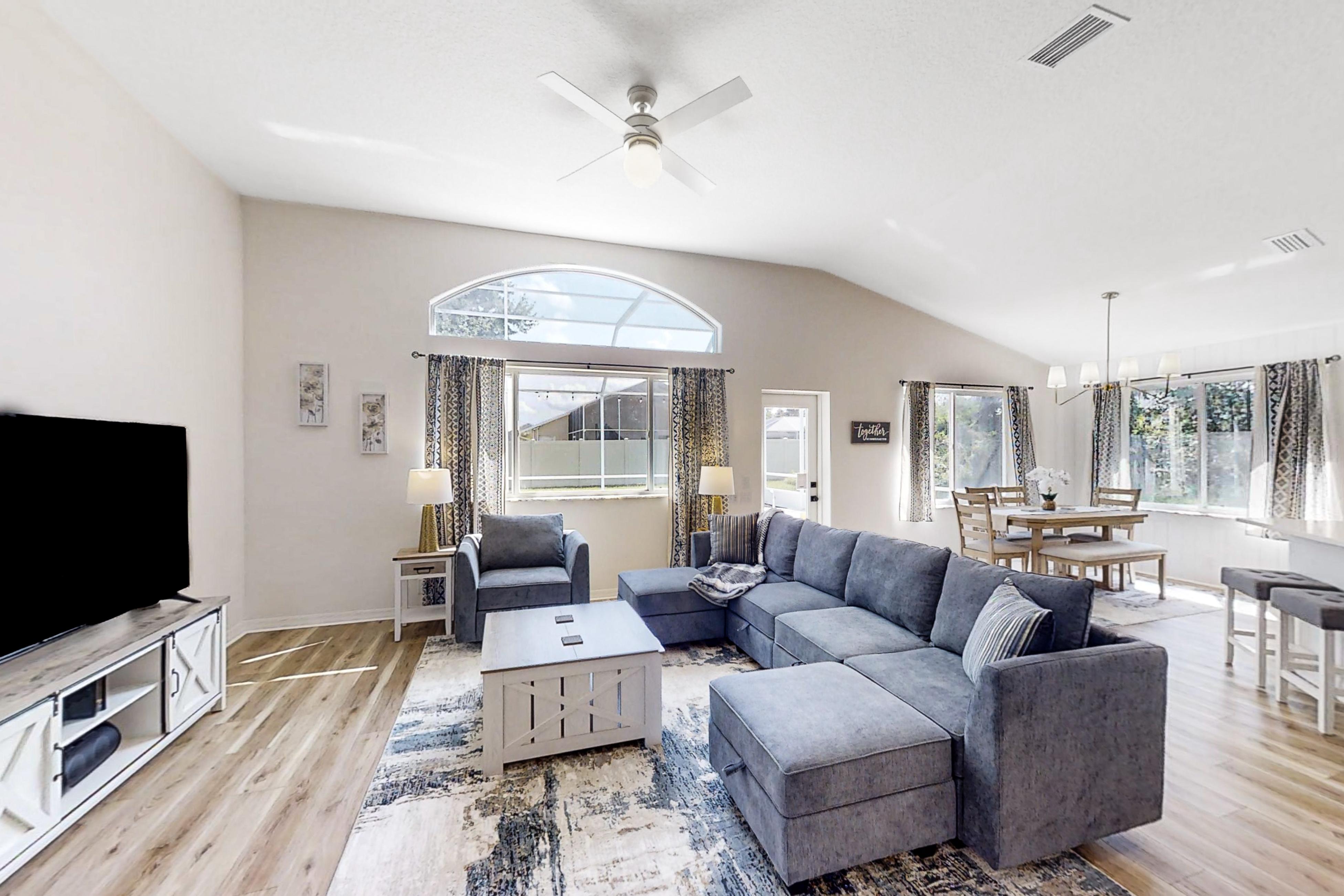 The Barefoot Bungalow | House in Palm Coast with an enclosed pool & grill