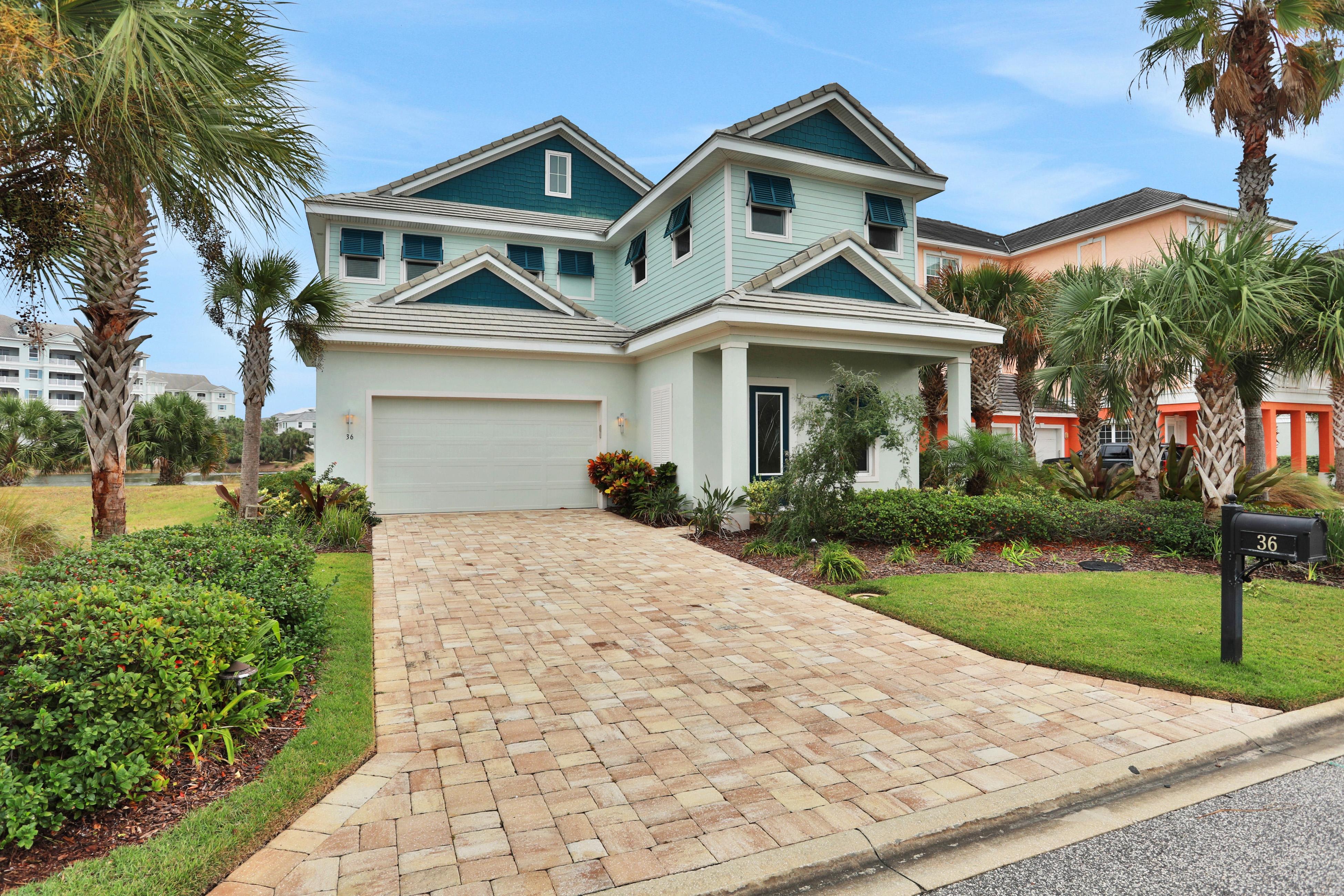 Palm-surrounded stunner with enclosed pool & water views - dog-friendly